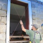 Man Restoring Window